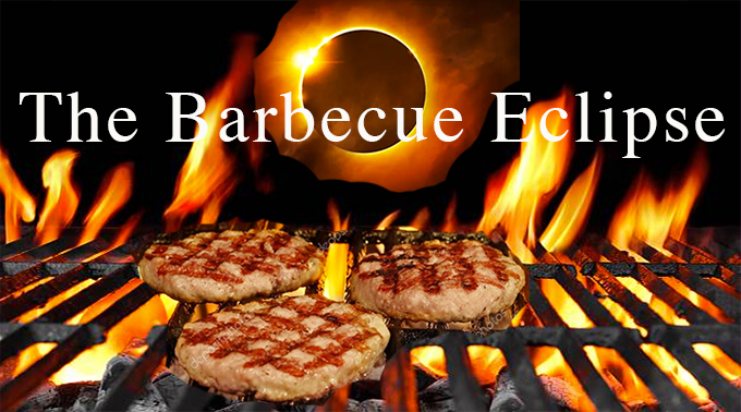 Burgers being barbecued while the sun eclipses